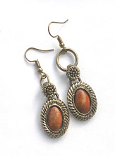 Brown and silver earrings